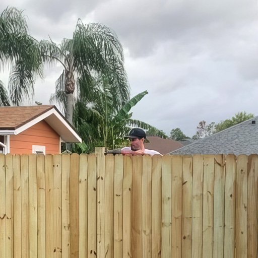 A Honey Do Service craftsman repairing a fence