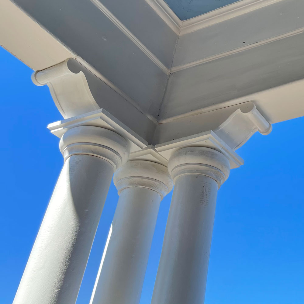 With the use of reference photos going back over the past 100 years, remnants of remaining molding, and a great amount of time and skill by our Master Craftsmen, the original molding and pillars were painstakingly recreated.