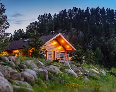 A holiday rental log cabin home in a tranquil forest setting