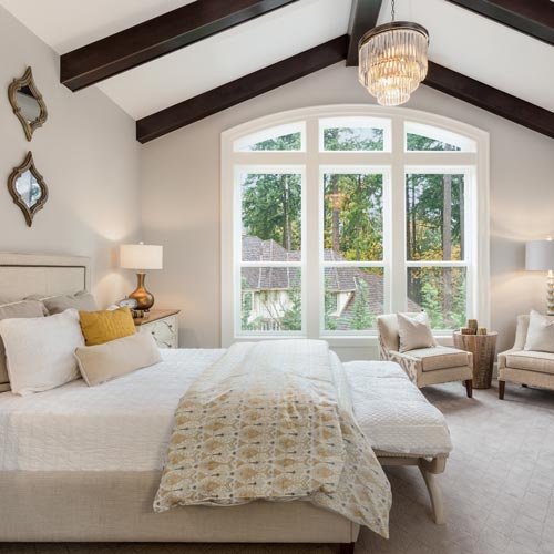 Beautiful furnished master bedroom interior in luxury home