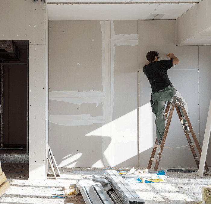 Honey Do Worker Remodeling House by Replacing Drywall